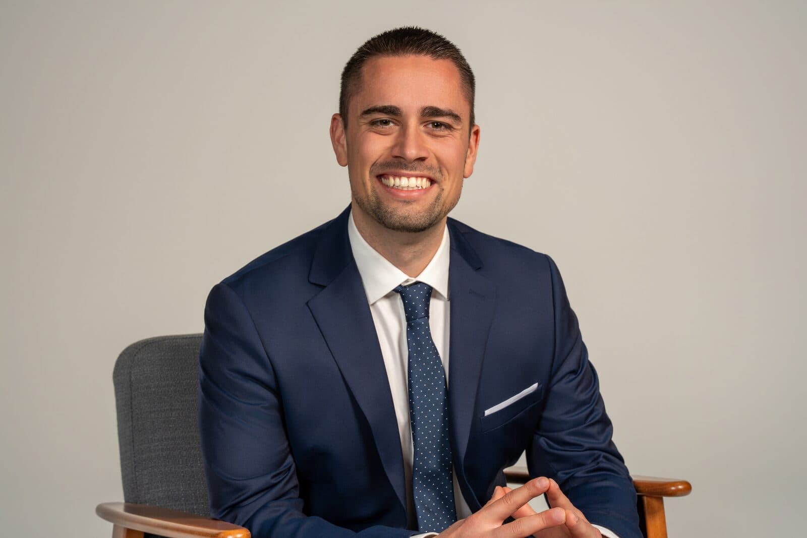 Chris Stambolidis, founder of Career Solutions Group — seated executive portrait